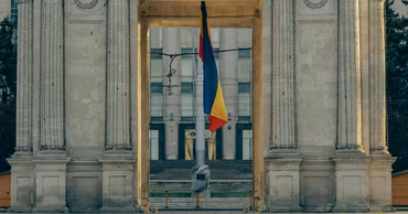 The Moldovan Government building viewed through the Triumphal Arch in Chisinau.