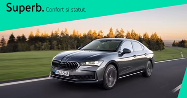 A grey Skoda Superb driving on a road with a green graphic overlay.