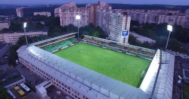Aerial view of Zimbru stadium in Chisinau during a football match.