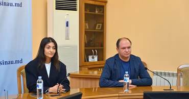 Ion Ceban sitting at a table during a press conference in Chisinau.
