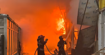 Firefighters battling a large blaze at a warehouse facility in Chisinau.