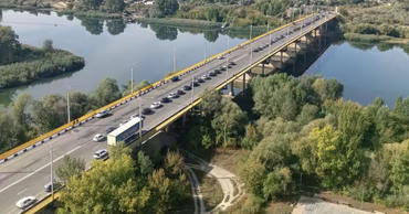 Aerial view of a bridge over the Dniester river with traffic.
