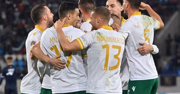 Bulgarian national football team players celebrating a goal on the field.