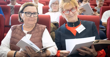 Elderly women attending a graduation ceremony at the University of the Third Age in Moldova.