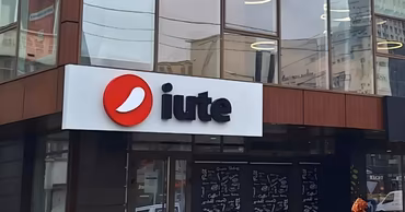 The exterior of an iute Moldova office building with the company logo visible.