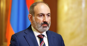 Armenian Prime Minister Nikol Pashinyan in a formal suit.