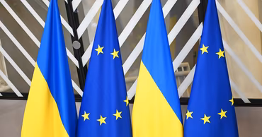 European Union and Ukrainian flags displayed side by side.