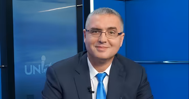 Renato Usatii in a studio setting.