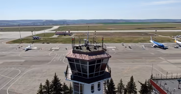 Aerial view of the MoldATSA air traffic control tower at Chisinau International Airport.