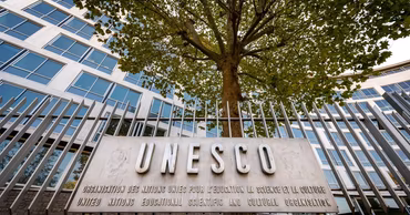The UNESCO headquarters building sign in Paris.