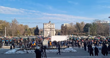 Farmers protesting with tractors in front of the Triumphal Arch in Chisinau, Moldova.