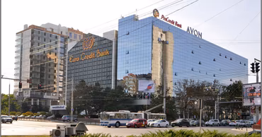 The Kentford office building in Chisinau, Moldova, with surrounding traffic and city infrastructure.