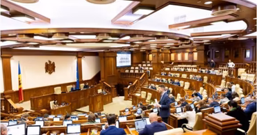 The interior of the Moldovan Parliament hall during a plenary session.