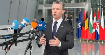 Swedish Defense Minister Pål Jonson speaking to journalists at a press conference.