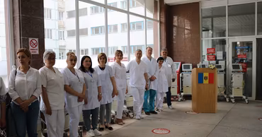 Medical staff standing in the lobby of the Balti Clinical Hospital.