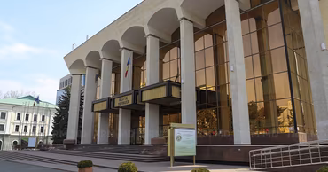 The Republic Palace building in Chisinau, Moldova, under a clear sky.