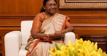 Indian President Droupadi Murmu sitting in an armchair.