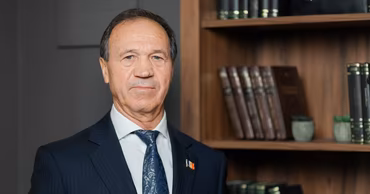 Portrait of Moldovan politician Fedor Gagauz in a suit.