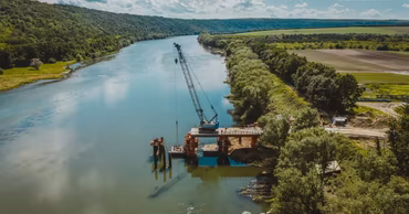 Aerial view of the construction site of the Cosauti-Iampol bridge over the Dniester river.