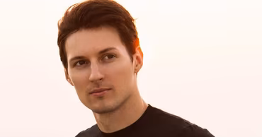 A portrait of Pavel Durov looking away from the camera.