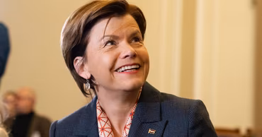 Latvian diplomat Baiba Braže smiling during an official event.