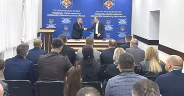 PCCOCS officials at a press conference in Moldova.