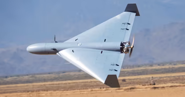 A Geran-3 military drone flying over a landscape.