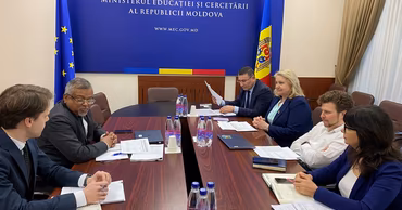 Officials at a meeting in the Ministry of Education and Research of Moldova.