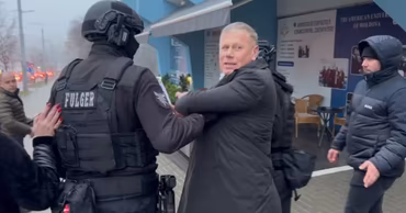 Nicanor Ciorchină being detained by Moldovan Fulger special police officers.