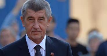Portrait of former Czech Prime Minister Andrej Babis in a suit.