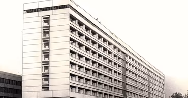 A black and white photograph of the large hospital building on Gheorghe Casu street in Chisinau.