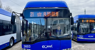 A blue RTEC trolleybus parked in a depot in Chisinau.