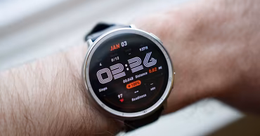 A close-up of an Amazfit smartwatch worn on a person's wrist.