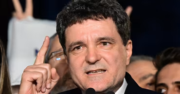 Nicușor Dan speaking at a public event.