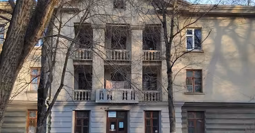 A multi-story building identified as a student dormitory in Moldova.