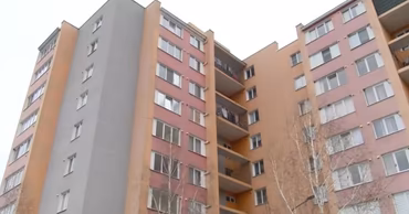 A multi-story residential apartment building in Moldova.