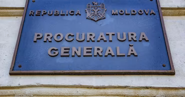 A sign on a building reading Republica Moldova Procuratura Generală.