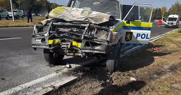 A damaged Moldovan police vehicle at the scene of a road accident.