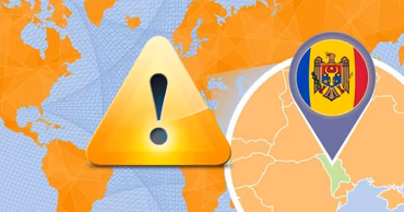 A warning sign icon and a map of Moldova with the national flag.