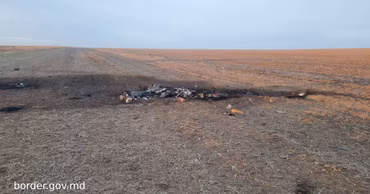 Debris from a drone or missile scattered in a field in Moldova.