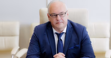 Paun Rogovei, Ambassador of Ukraine to Moldova, sitting at a table.