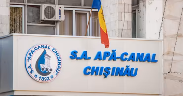 The headquarters building and logo of the Apă-Canal Chișinău water utility company.