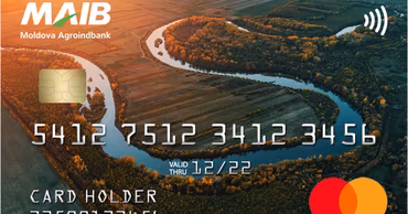 A Mastercard bank card issued by Moldova Agroindbank featuring a landscape design.