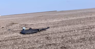 Debris of a fallen drone lying in a field in Moldova.