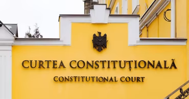 The building facade of the Constitutional Court of Moldova with its official sign.